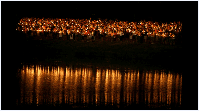 photo of candles lit on a wharf