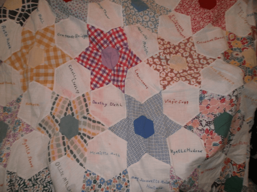 Photo: cigar girls’ quilt showing the quilters’ names
