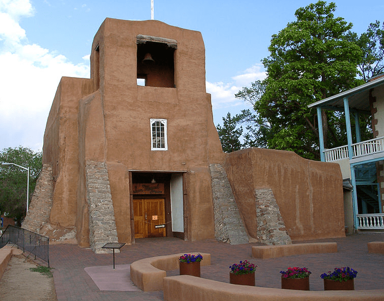 Photo: San Miguel Chapel, Santa Fe, New Mexico, the oldest church structure in the U.S. Original adobe walls built in approximately 1610 A.D.