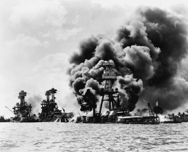 Photo: U.S. Navy battleships at Pearl Harbor on 7 December 1941 (l-r): USS West Virginia (sunk), USS Tennessee (damaged), and USS Arizona (sunk)