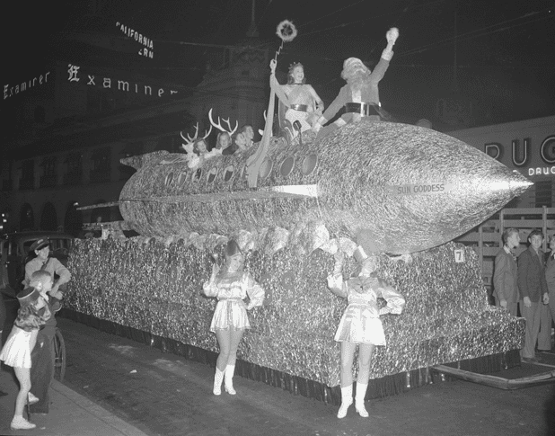 Photo: Christmas parade in Los Angeles, California, featuring a rocket ship float with Santa Claus, 1940
