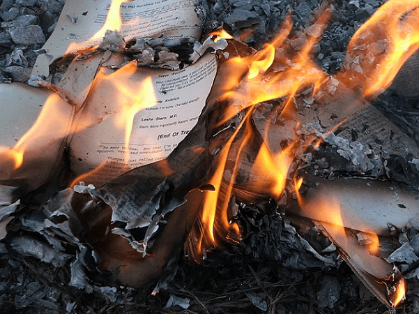 Photo: a burning book. Credit: LearningLark; Wikimedia Commons.
