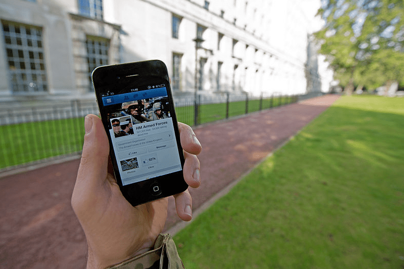 Photo: a Facebook page on a mobile phone
