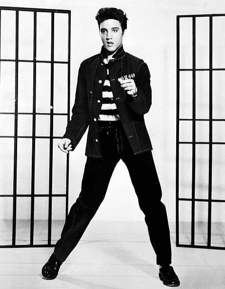 Photo: a publicity photograph of Elvis Presley promoting the film "Jailhouse Rock," 1957