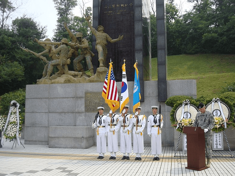 Photo: South Korean sailors in formation in front of the Task Force Smith memorial at Osan, South Korea