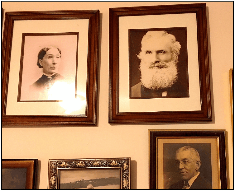 Photo: pictures of ancestors hanging on a wall