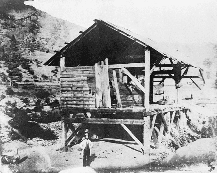 Photo: “Photomechanical reproduction of the 1850 daguerreotype by R. H. Vance shows James Marshall standing in front of Sutter’s sawmill, Coloma, California, where he discovered gold.”