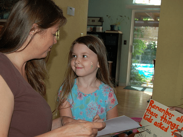 Photo: mother and daughter and Mother's Day card. Credit: Dave Parker; Wikimedia Commons.