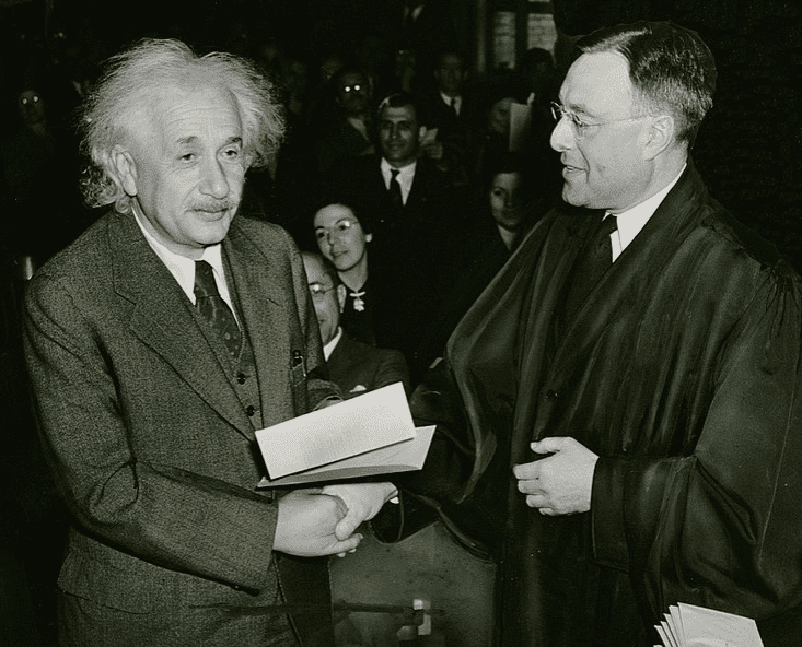 Photo: Albert Einstein receiving his certificate of American citizenship from Judge Phillip Forman, 1 October 1940