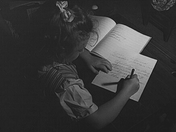 Photo: third grader at the Elmer Avenue Elementary School in Schenectady, New York. Credit: Philip Bonn; Library of Congress, Prints and Photographs Division.