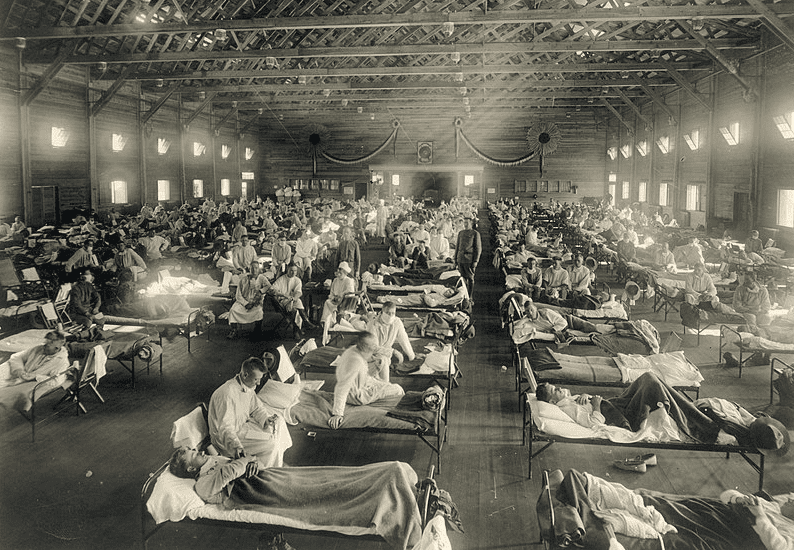 Photo: soldiers from Fort Riley, Kansas, ill with Spanish flu at a hospital ward at Camp Funston