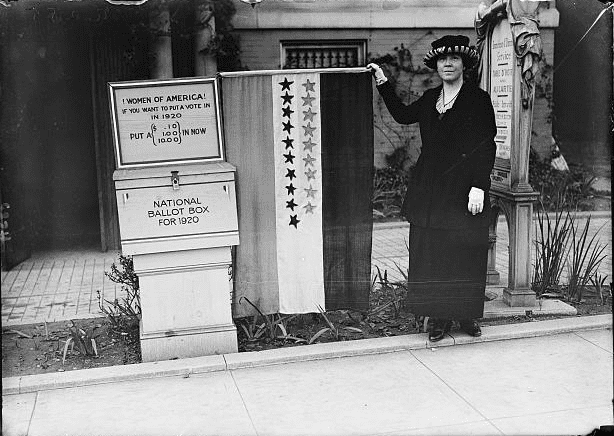 Photo: “Women of America! If you want to put a vote in in 1920 put a (.10, 1.00, 10.00) in now. National Ballot Box for 1920”