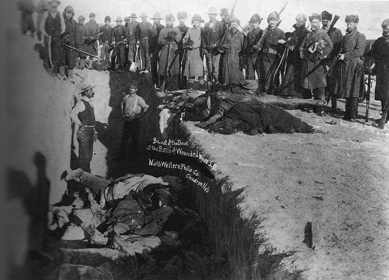 Photo: burial of the dead after the massacre of Wounded Knee, South Dakota