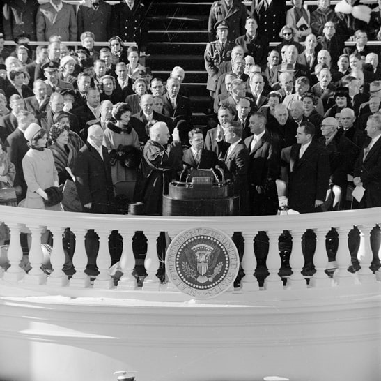 Photo: Chief Justice Earl Warren administers the Presidential oath of office to John F. Kennedy at the Capitol, 20 January 1961