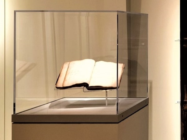 Photo: Joshua Buffum’s account book in a glass case. Credit: Peabody Essex Museum.