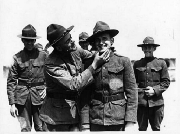 Photo: American soldiers at the front during WWI, c. 1918. Credit: Flickr: The Commons.