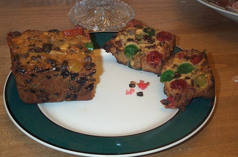 Photo: traditional American Fruit Cake with fruits and nuts