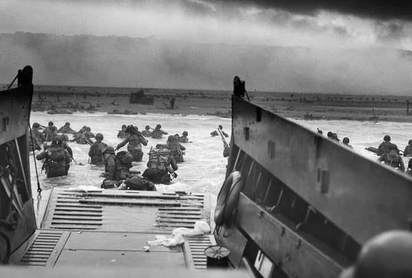Photo: U.S. troops landing during D-Day, 6 June 1944. Credit: Chief Photographer's Mate Robert F. Sargent; National Archives and Records Administration; Wikimedia Commons.
