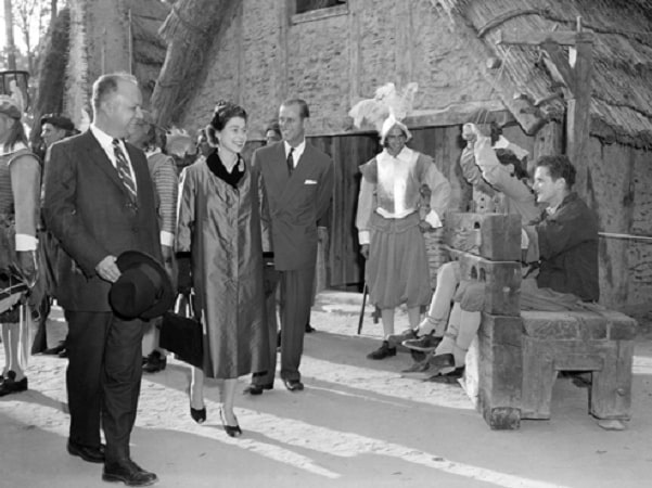 Photo: Queen Elizabeth and Prince Philip smile as they pass prisoners in the stocks on a tour of the old fort in Festival Park at Jamestown, Virginia, in 1957. Credit: Library of Congress, Prints and Photographs Division.