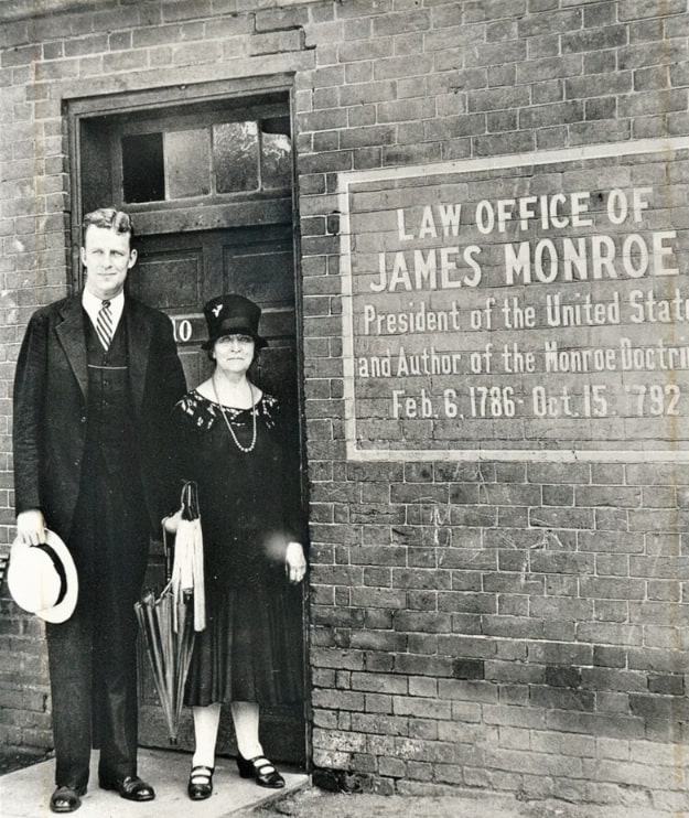 Photo: Rose De Chine Gouverneur Hoes and her son Laurence Gouverneur Hoes in front of the law office of James Monroe in 1928, which the family acquired and used to establish a museum to preserve objects from their direct ancestor President James Monroe. Courtesy of the James Monroe Museum of Fredericksburg, Virginia.