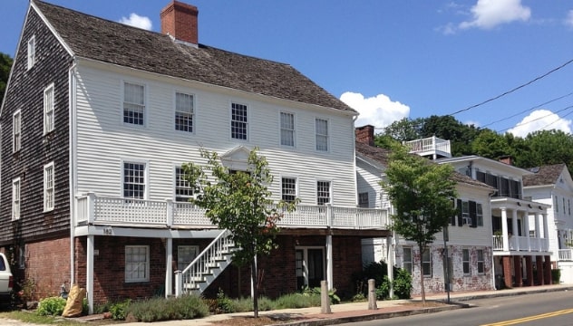 Photo: historic homes along Front Street in New Haven, Connecticut. Credit: Iracaz; Wikimedia Commons.