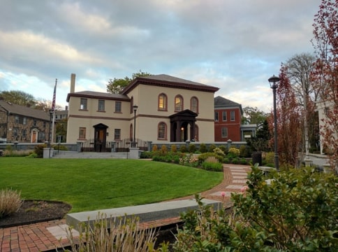 Photo: Touro Synagogue and gardens. The oldest synagogue in America, built in 1763, it is an active synagogue and is located in the historic district of Newport, Rhode Island. Credit: Zellner55; Wikimedia Commons.
