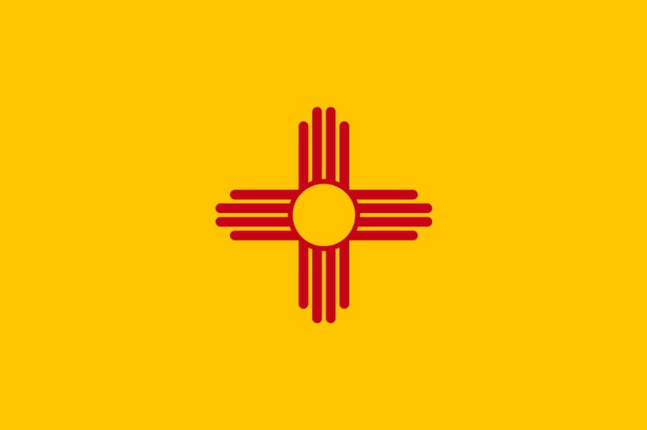 Illustration: New Mexico state flag. Credit: Wikimedia Commons.