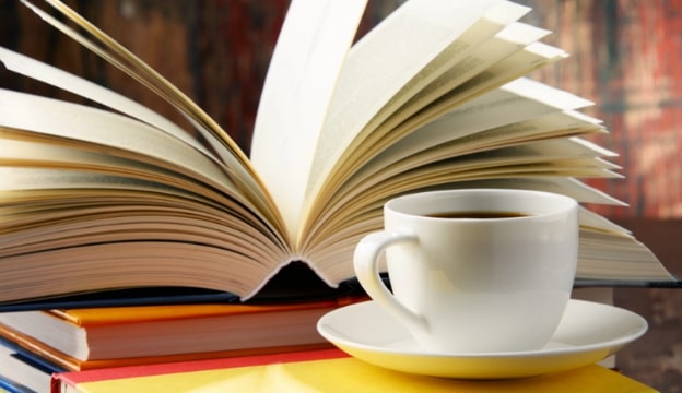 books and a cup of coffee. Credit: https://depositphotos.com/home.html