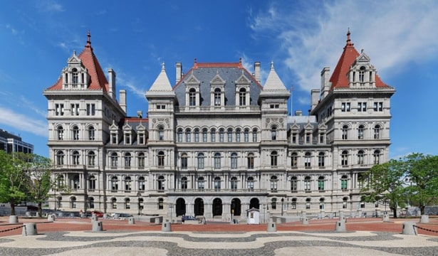 Photo: the New York State Capitol in Albany, New York. Credit: Matt H. Wade; Wikimedia Commons.