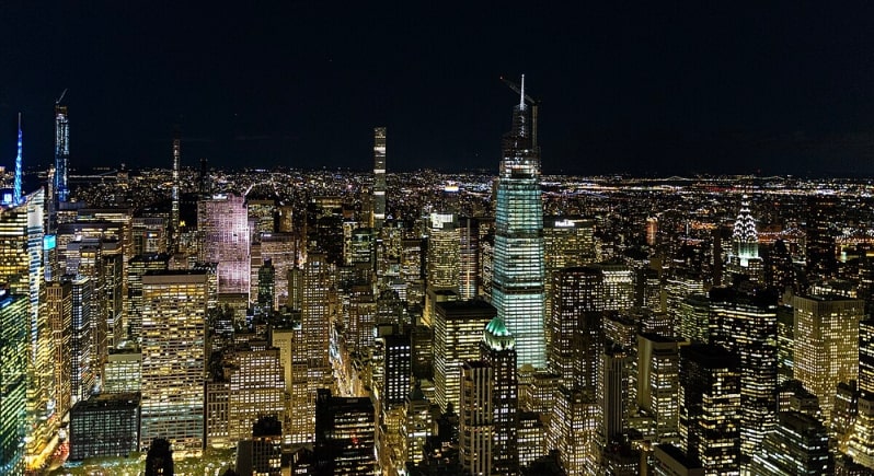 Photo: New York City at night. Credit: chsyang; Wikimedia Commons.