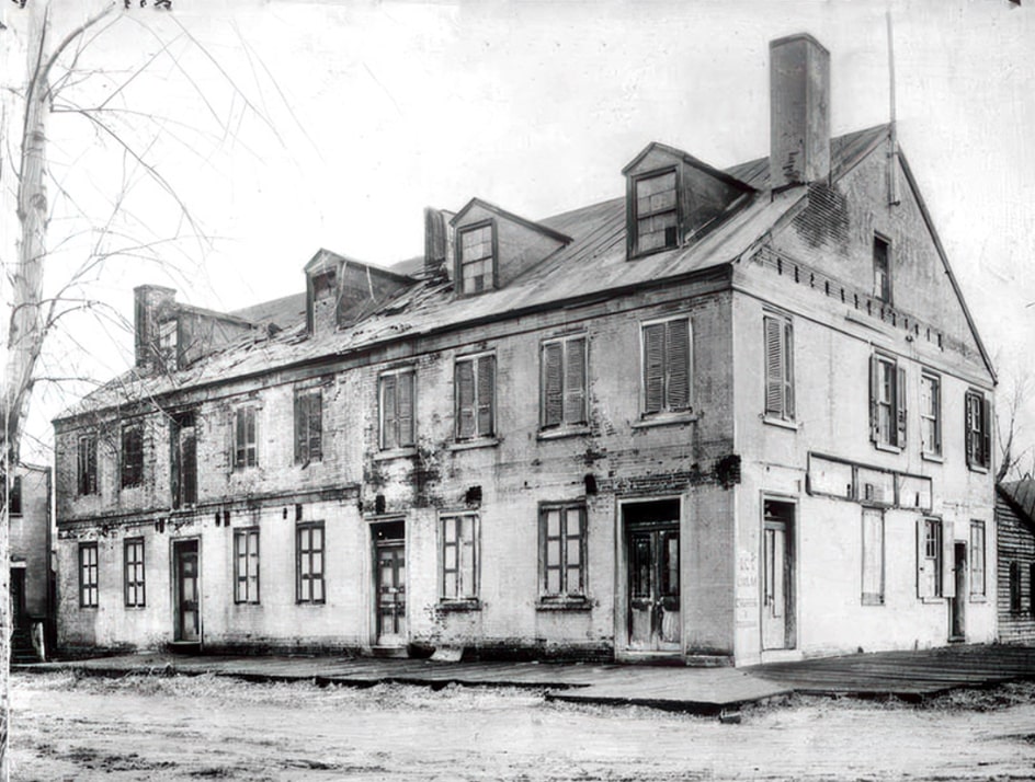 Photo: Hugg’s Tavern on the waterfront of Gloucester City, one of the busiest taverns on the New Jersey side of the Delaware River. Credit: Gloucester County Historical Society.