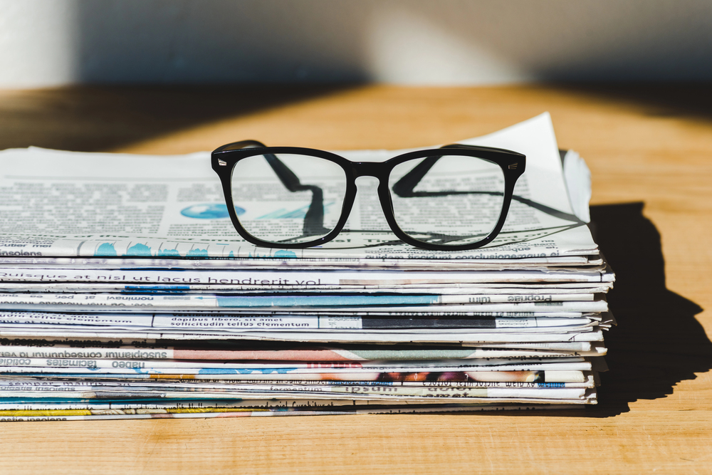 Photo: newspapers and glasses.
