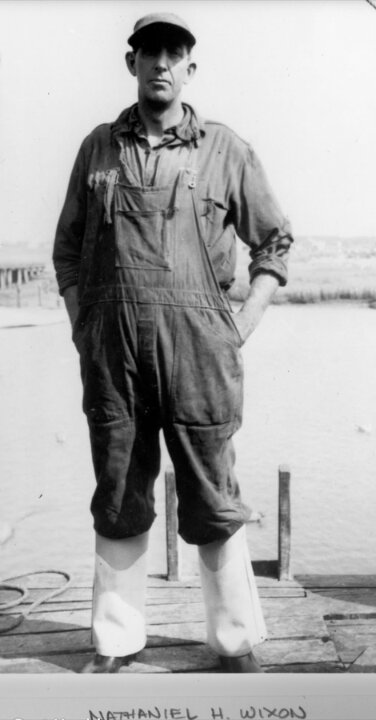 Photo: Than Wixon on a dock in fishing gear. Credit: Jennifer (Koehler) Mackall.