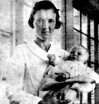 Photo: Cape Cod Hospital nurse Hilda Slater holding the abandoned baby discovered in the woods of Mashpee, Massachusetts, published in the Boston Herald on 19 July 1935.