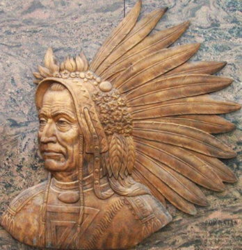 Photo: close-up of the Powhatan bronze. Credit: Pamunkey Indian Museum and Cultural Center.