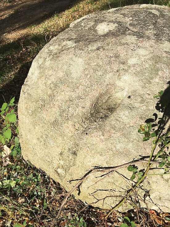 Photo: the “Devil’s Footprint” rock on the Sylvester Manor House property, Shelter Island. Credit: Annette Hinkle.